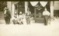 Primary view of Men in Front of a Store