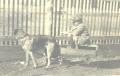 Photograph: Young Boy with a Dog