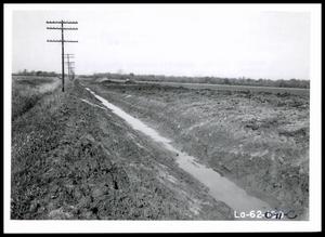 Primary view of object titled 'Completed Drainage Ditch With Spoil Bank Spread'.