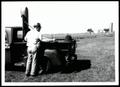 Photograph: Roscoe Long, Soil Scientist, SCS, Examining a Pedon of the Bethany Se…