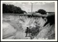 Photograph: Highway Roadside Undercut By Floodwaters