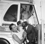 Photograph: People Boarding a Bus to an NAACP Convention