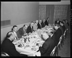 Photo of Large Group of Men Dining