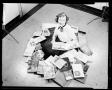 Photograph: Woman with Yearbooks