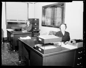 People Working at Desks for General Food Sales Company in Oklahoma City, Oklahoma