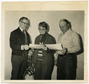 Primary view of object titled 'Men Receiving Award'.