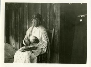 Cherokee woman who lived on Hungry Mt. rolling yarn
