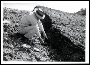 W. A. Bruce Shows Topsoil and Fill Material Washed Off Backside of Dam, Site 2 Deep Creek
