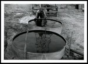 George Hamilton Observing Flow of Water From New Well Built With GPCP Assistance on His Big Dipper Ranch