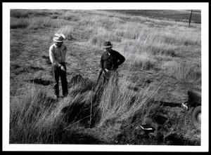 Fred L. Whittington and I. C. Thurmond, Jr. Discussing Moisture Intake on the Red Rock Ranch
