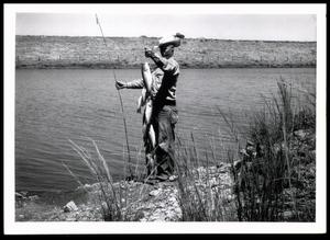 Clarence Fowler with Fish Caught From One of the Twenty-four Detention Reservoirs