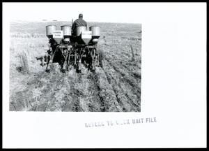 Robert N. Spowls Overseeding A Field