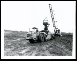 Crane and Dirt Mover on or Near Roaring Creek Site 104