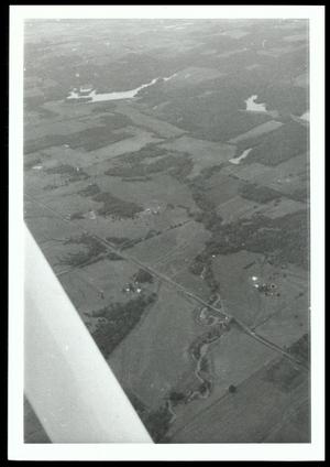 Aerial Shot of a Piece of Land Containing Small Bodies of Water and Trees