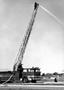 Photograph: Fireman on ladder