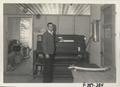 Photograph: Preston McMillan with Printing Machine