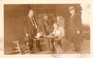 Gordon W. Lillie, Albert Lillie, and Two Others Signing Documents