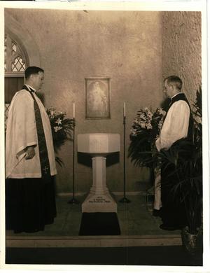 Rev. Eckel and Bishop Casady at Baptismal Font