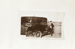 Man and Woman with Old Car
