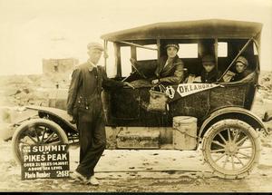 Tourists in Automobile Bound with Oklahoma Banner