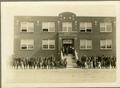 Photograph: Booker T. Washington School with a Group at the Front