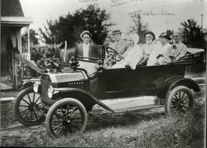 Ben Bird with a Group in an Early Automobile