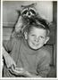 Thumbnail image of item number 1 in: 'Raccoon and Boy'.