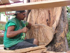 Man Working on Woodcarving