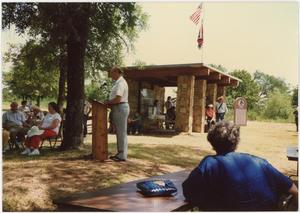 Primary view of object titled 'Man Speaking at a Gathering at Honey Springs Battlefield'.