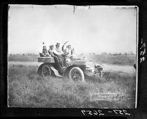 Automobile Carrying Indians from 101 Ranch